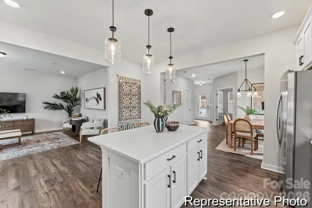a view of center kitchen island dining table and chairs