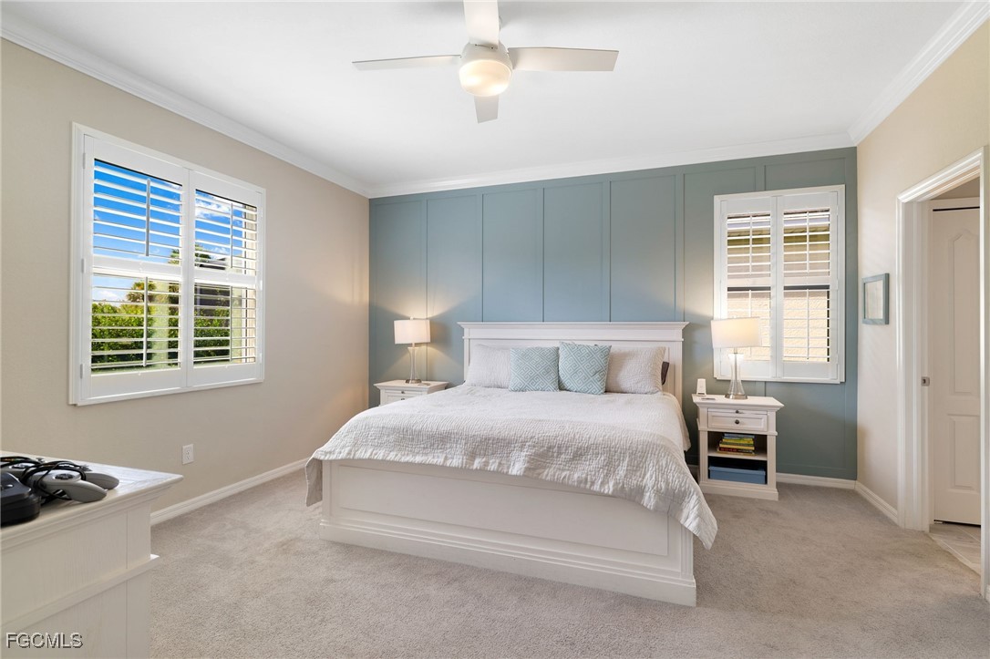 9778 Mirada Boulevard Fort Myers, FL 33908 - Photo 16 of 29 a bedroom with a bed and a window