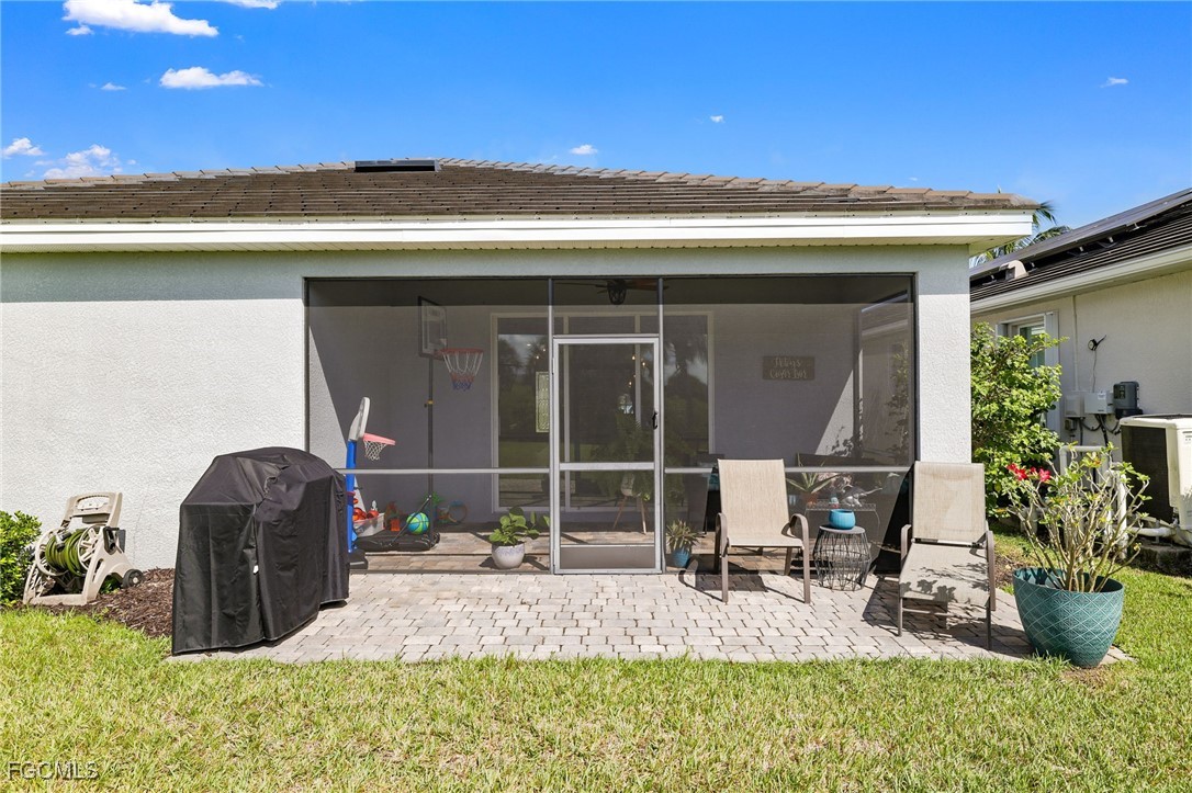 9778 Mirada Boulevard Fort Myers, FL 33908 - Photo 28 of 29 a view of two chairs and table in patio