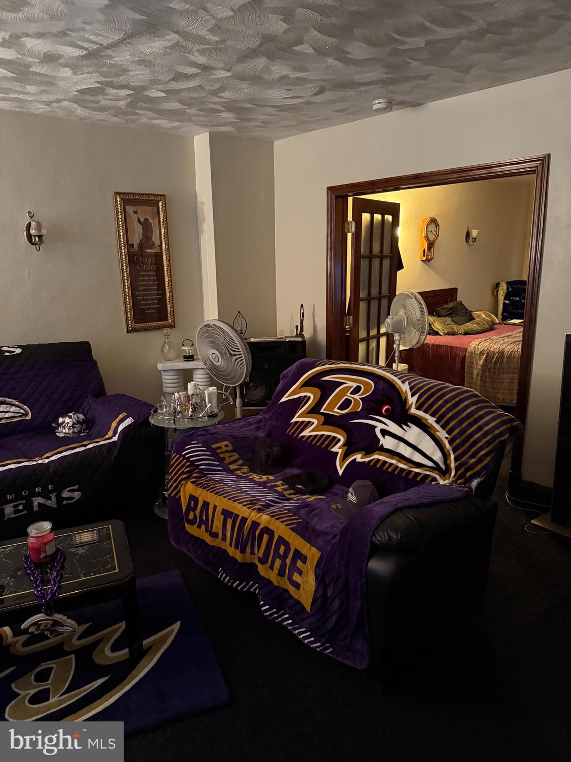 703 North Augusta Avenue Baltimore, MD 21229 - Photo 5 of 14 a bedroom with a bed and a window