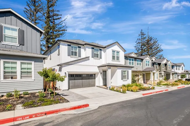 a front view of a house with street