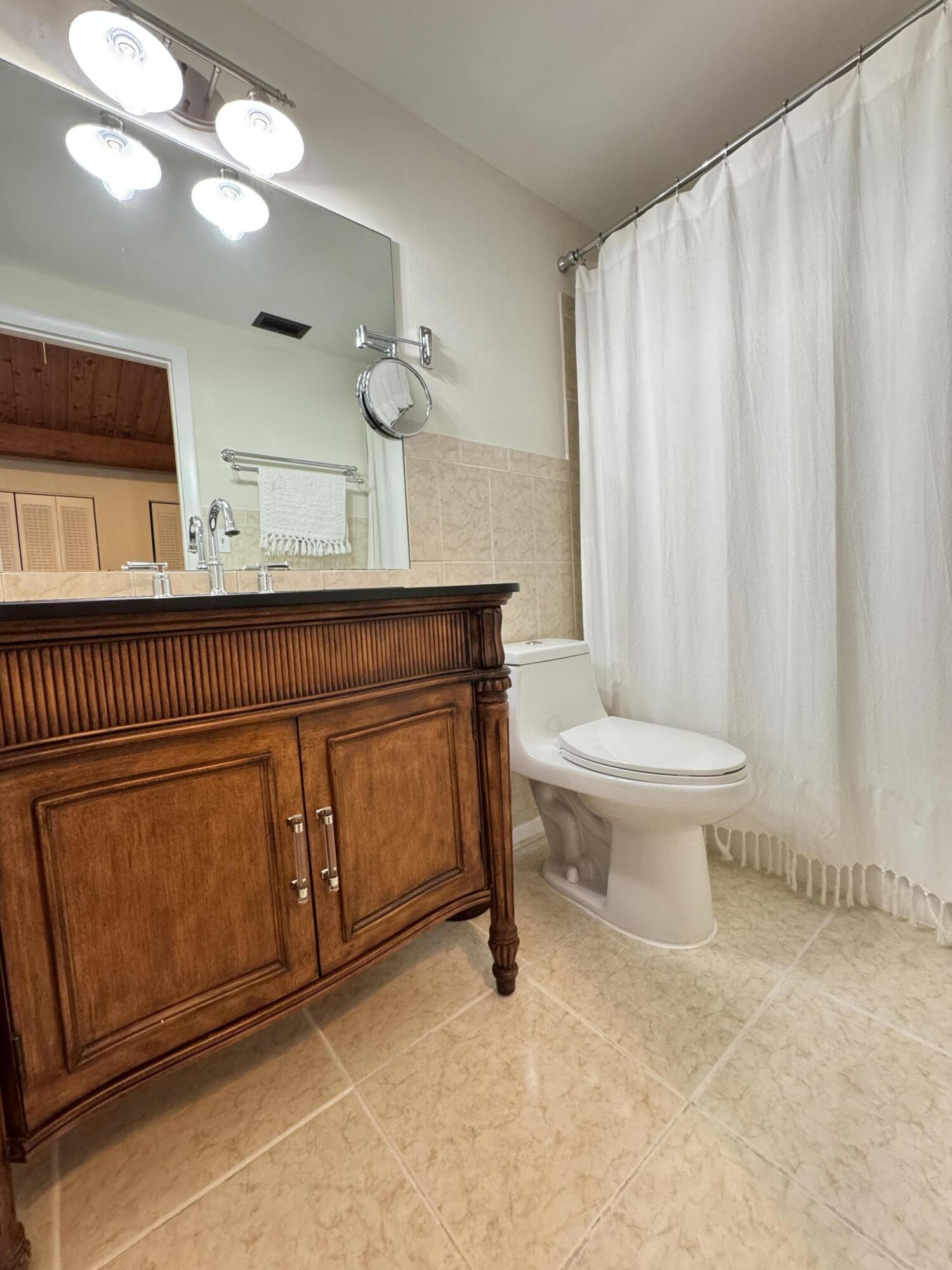 4601 Northwest 2nd Avenue, Unit 805 Boca Raton, FL 33431 - Photo 18 of 34 updated guest bath