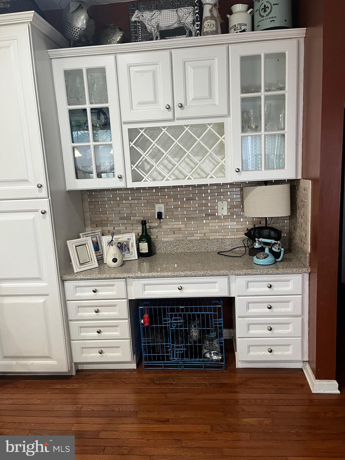 67 Lavender Drive Sewell, NJ 08080 - Photo 11 of 25 a view of granite countertop white cabinets and wooden floor