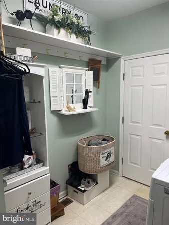 a room with furniture and window