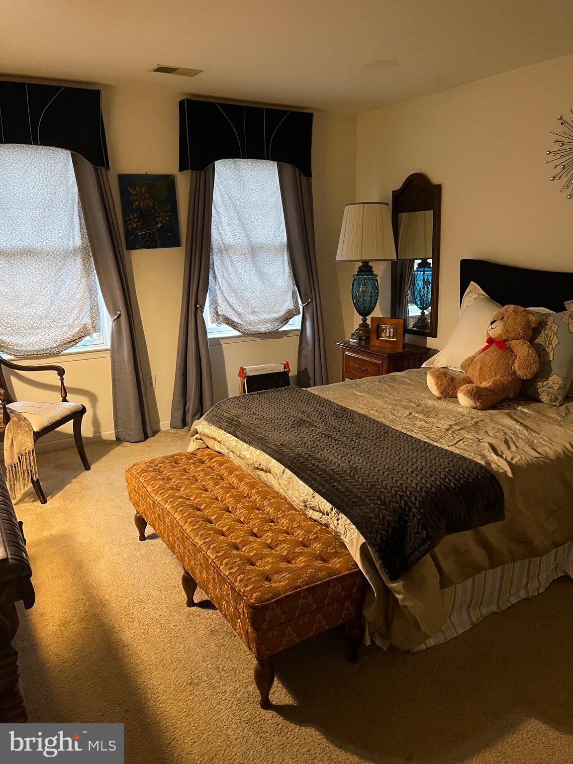 67 Lavender Drive Sewell, NJ 08080 - Photo 22 of 25 a bed sitting in a bedroom next to a window