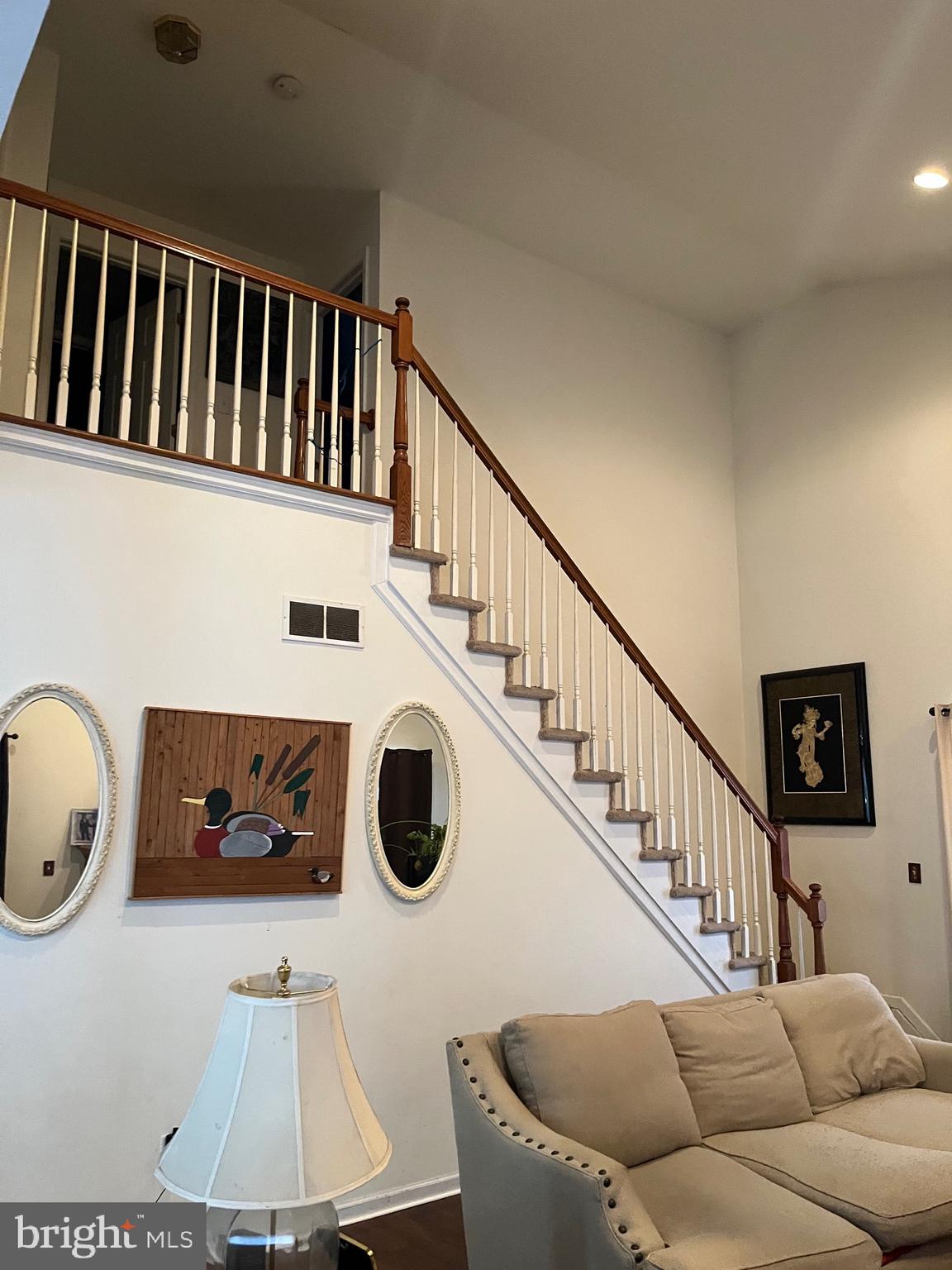 67 Lavender Drive Sewell, NJ 08080 - Photo 6 of 25 a living room with couches and a table with wooden floor