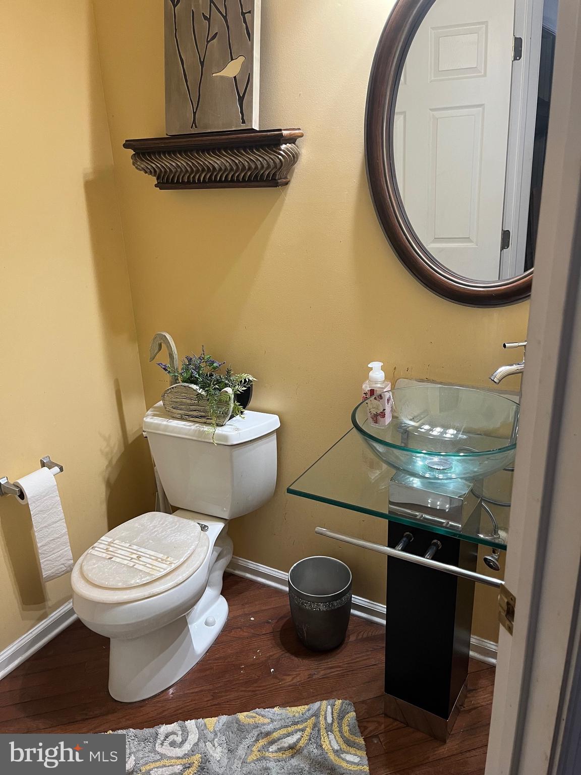 67 Lavender Drive Sewell, NJ 08080 - Photo 7 of 25 a bathroom with a toilet and a mirror