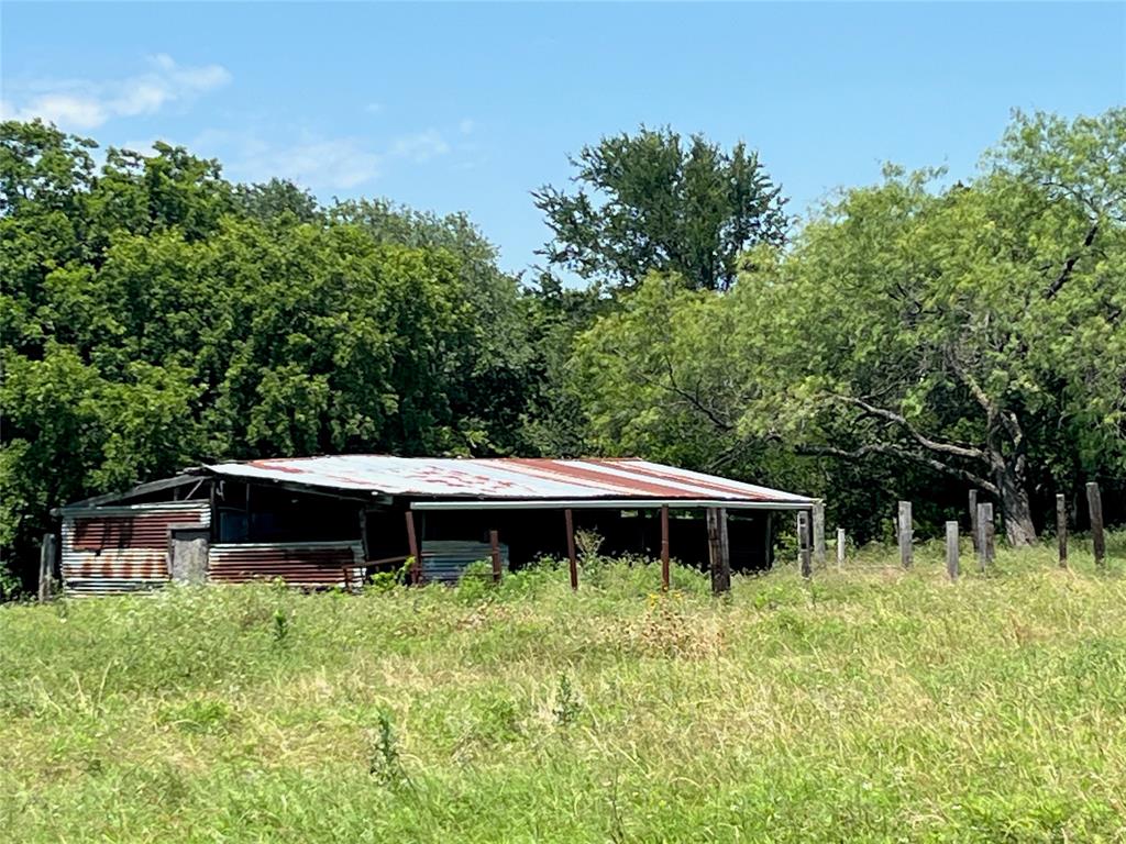 731 St Burleson, TX 76028 - Photo 11 of 35 a front view of a house with a yard
