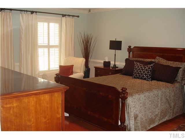 1921 Torrington Street Raleigh, NC 27615 - Photo 14 of 25 Beautiful master suite with hardwood floors.