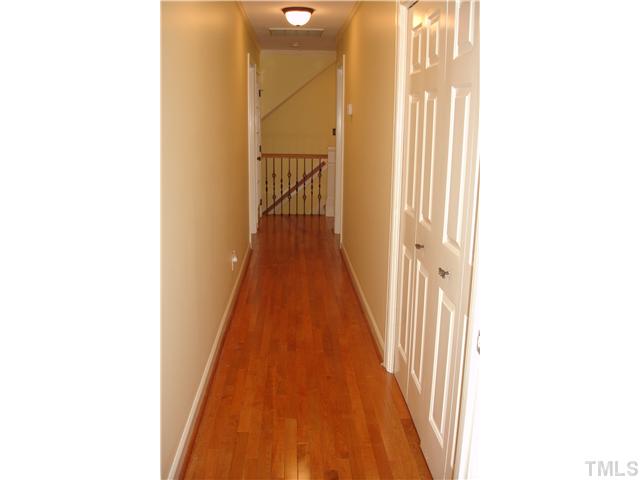 1921 Torrington Street Raleigh, NC 27615 - Photo 17 of 25 They even added hardwood floors in the hallway.
