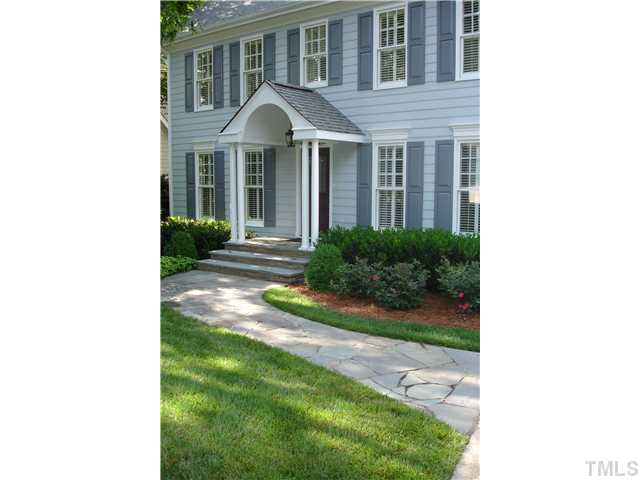 1921 Torrington Street Raleigh, NC 27615 - Photo 2 of 25 This home is in such a lovely setting with mature trees and professional landscaping.