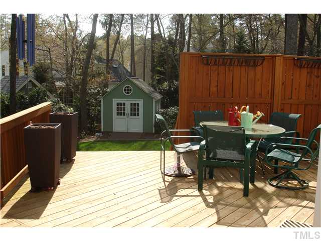 1921 Torrington Street Raleigh, NC 27615 - Photo 25 of 25 Large deck in addition to the porch.