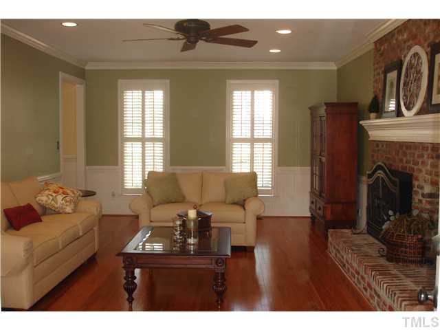 1921 Torrington Street Raleigh, NC 27615 - Photo 3 of 25 Large living room with hardwood floors.
