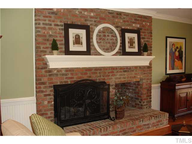1921 Torrington Street Raleigh, NC 27615 - Photo 4 of 25 Grand masonry fireplace with gas logs.
