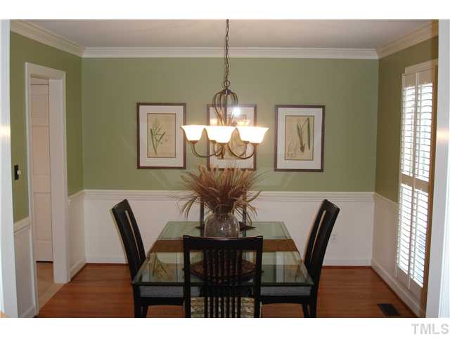 1921 Torrington Street Raleigh, NC 27615 - Photo 10 of 25 Lovely dining room with nice trim and hardwood floors.