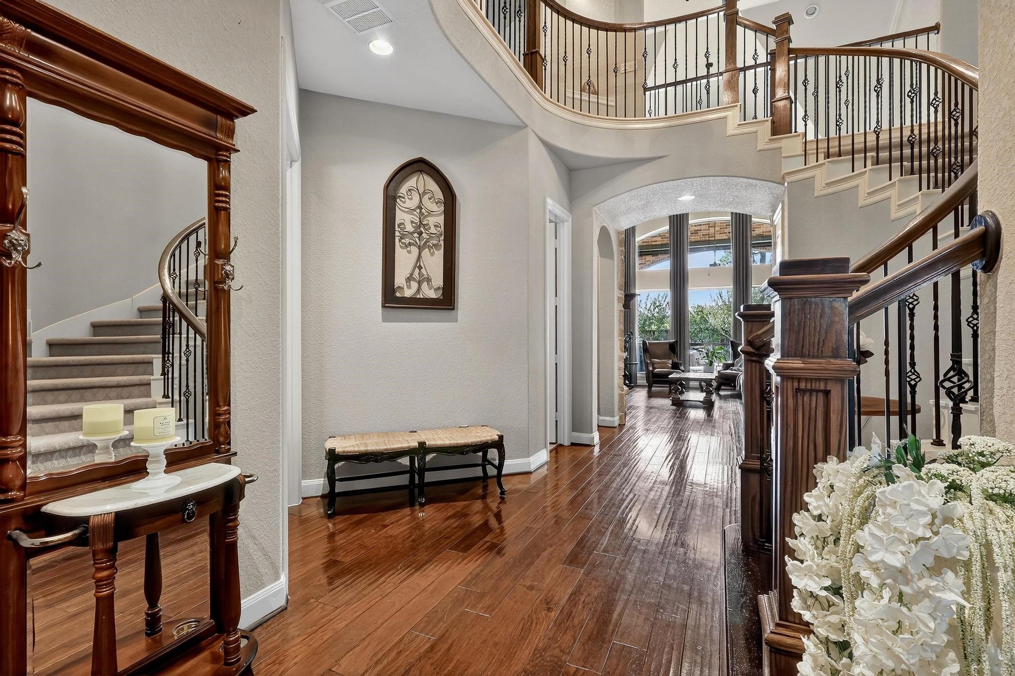 25803 Heritage Maple Drive Spring, TX 77389 - Photo 7 of 46 a view of entryway livingroom and hall with wooden floor