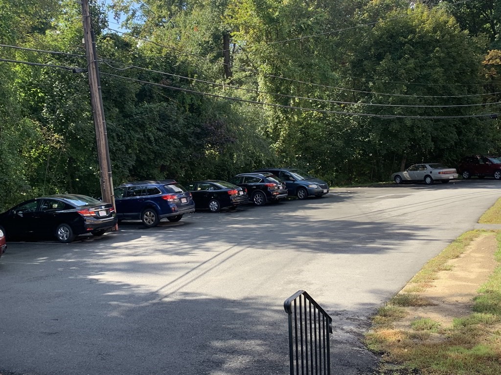 424 Great Road, Unit 2 Acton, MA 01720 - Photo 11 of 13 a view of street with parked cars