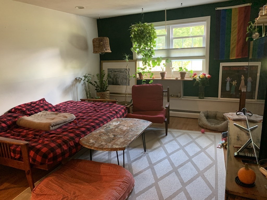 424 Great Road, Unit 2 Acton, MA 01720 - Photo 4 of 13 a view of a dining room with furniture window and outside view