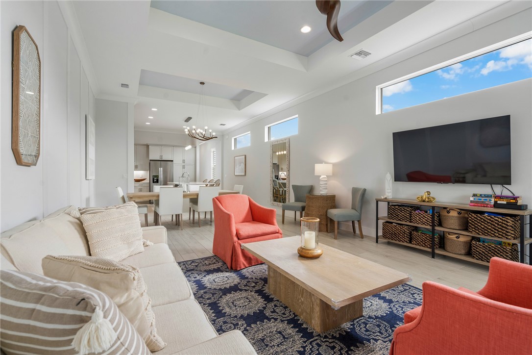 2159 Falls Manor Vero Beach, FL 32967 - Photo 22 of 36 a living room with furniture and a flat screen tv