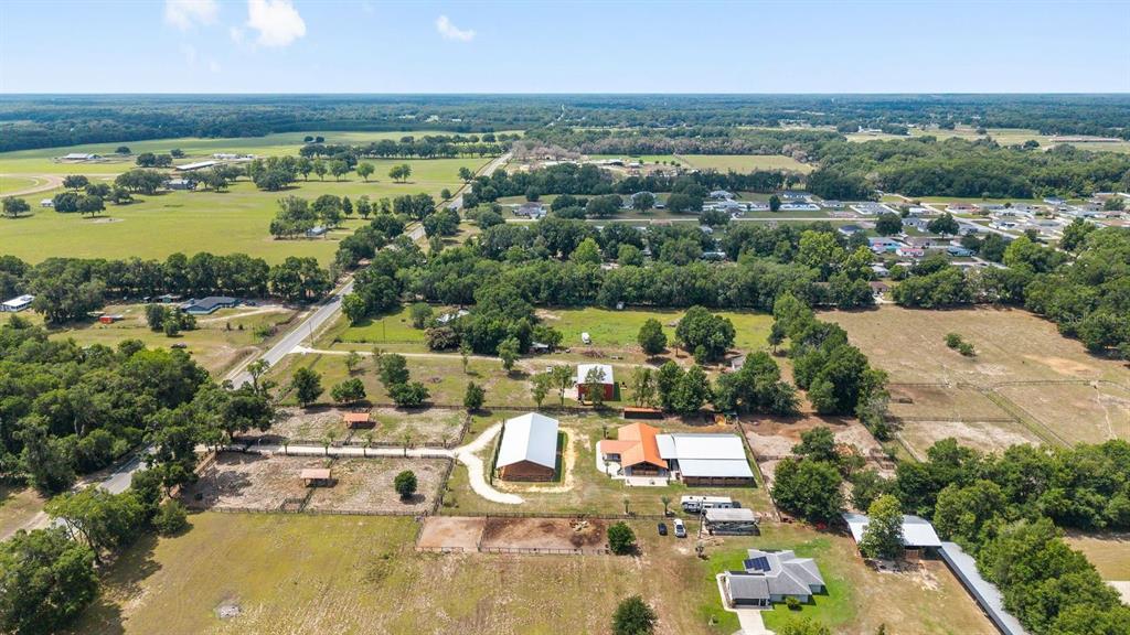 16392 Northeast Jacksonville Road Citra, FL 32113 - Photo 43 of 44 a view of a lake with a city