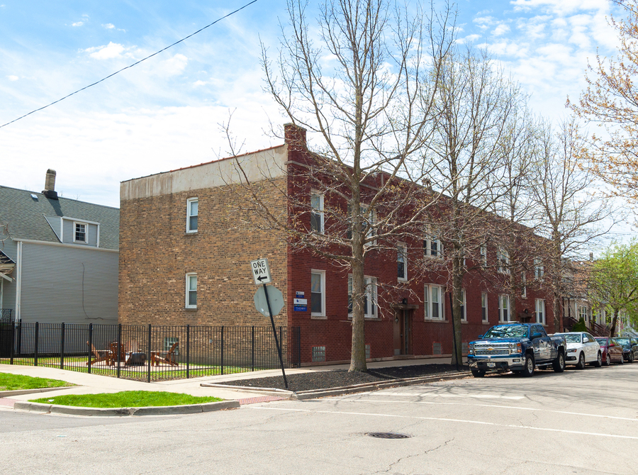 2641 West George Street, Unit 1 Chicago, IL 60618 - Photo 1 of 11 a car parked in front of a building