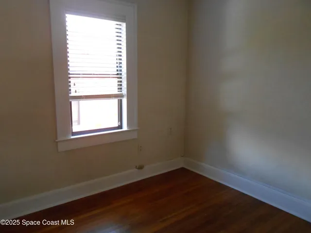 a view of a garden with potted plants