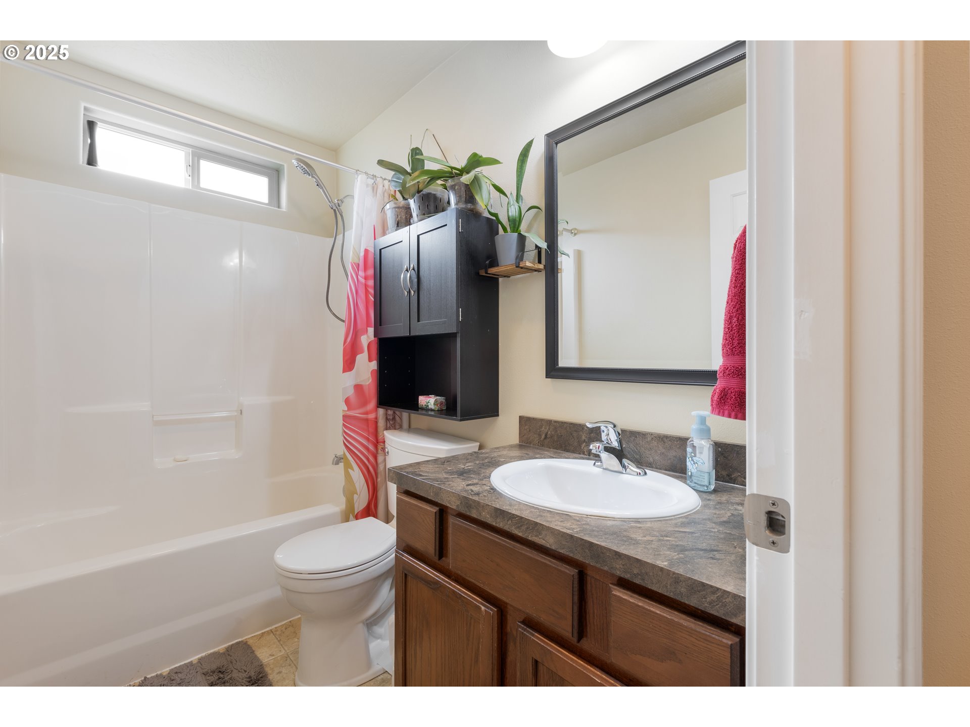 335 Gentry Loop Myrtle Creek, OR 97457 - Photo 28 of 41 a bathroom with a sink vanity mirror and toilet