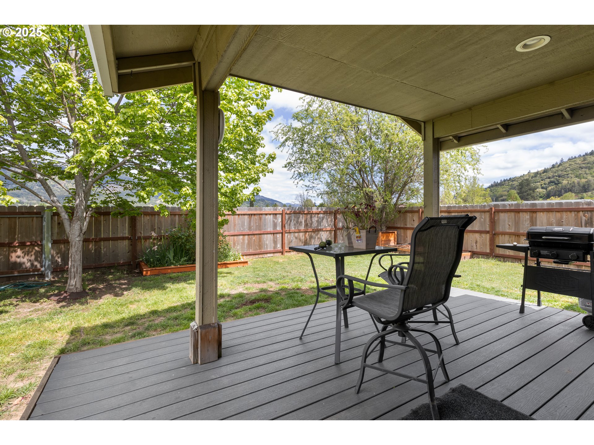 335 Gentry Loop Myrtle Creek, OR 97457 - Photo 35 of 41 a view of sitting area with furniture and wooden floor