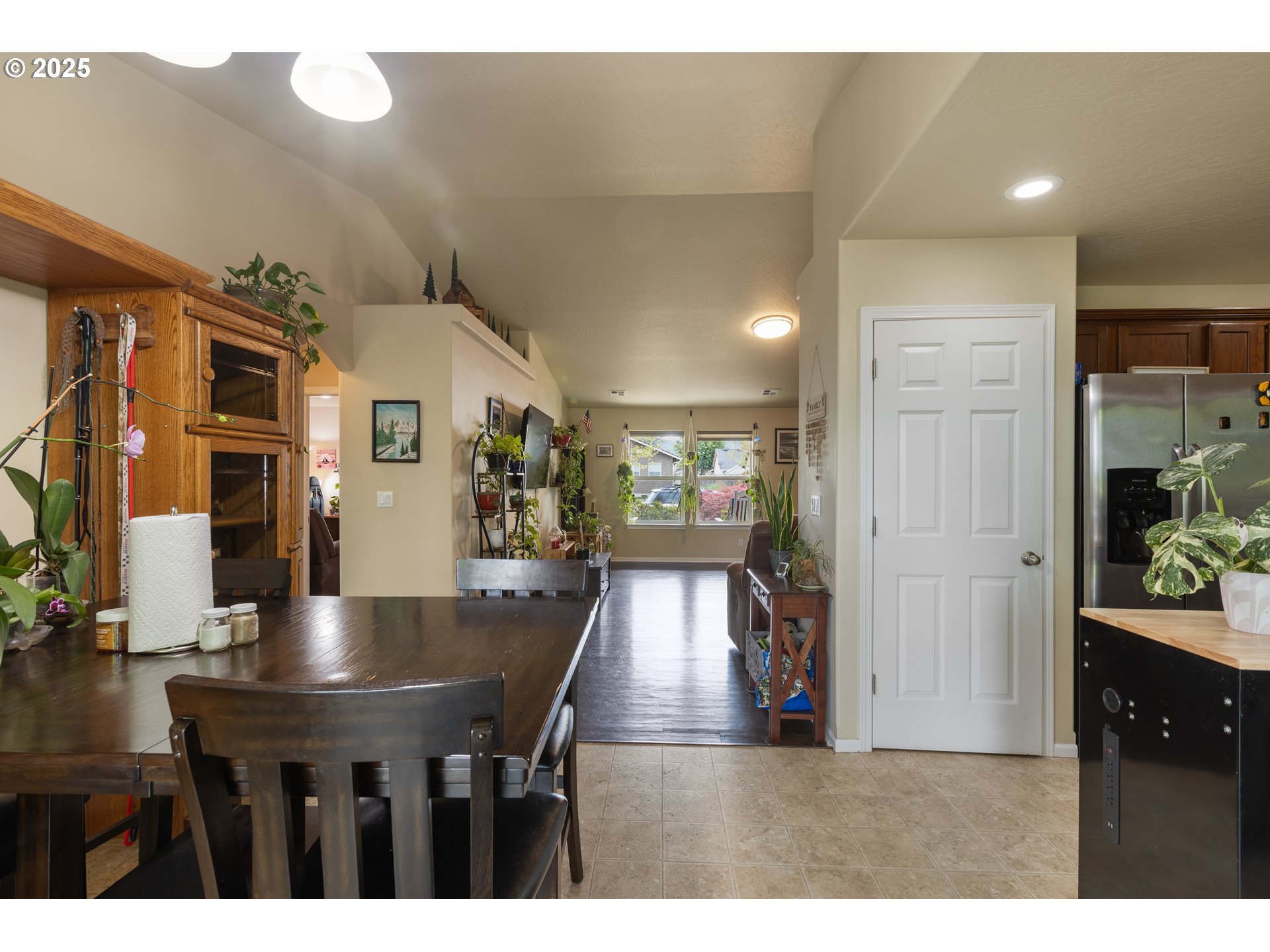 335 Gentry Loop Myrtle Creek, OR 97457 - Photo 10 of 41 a view of a dining room with furniture and chandelier
