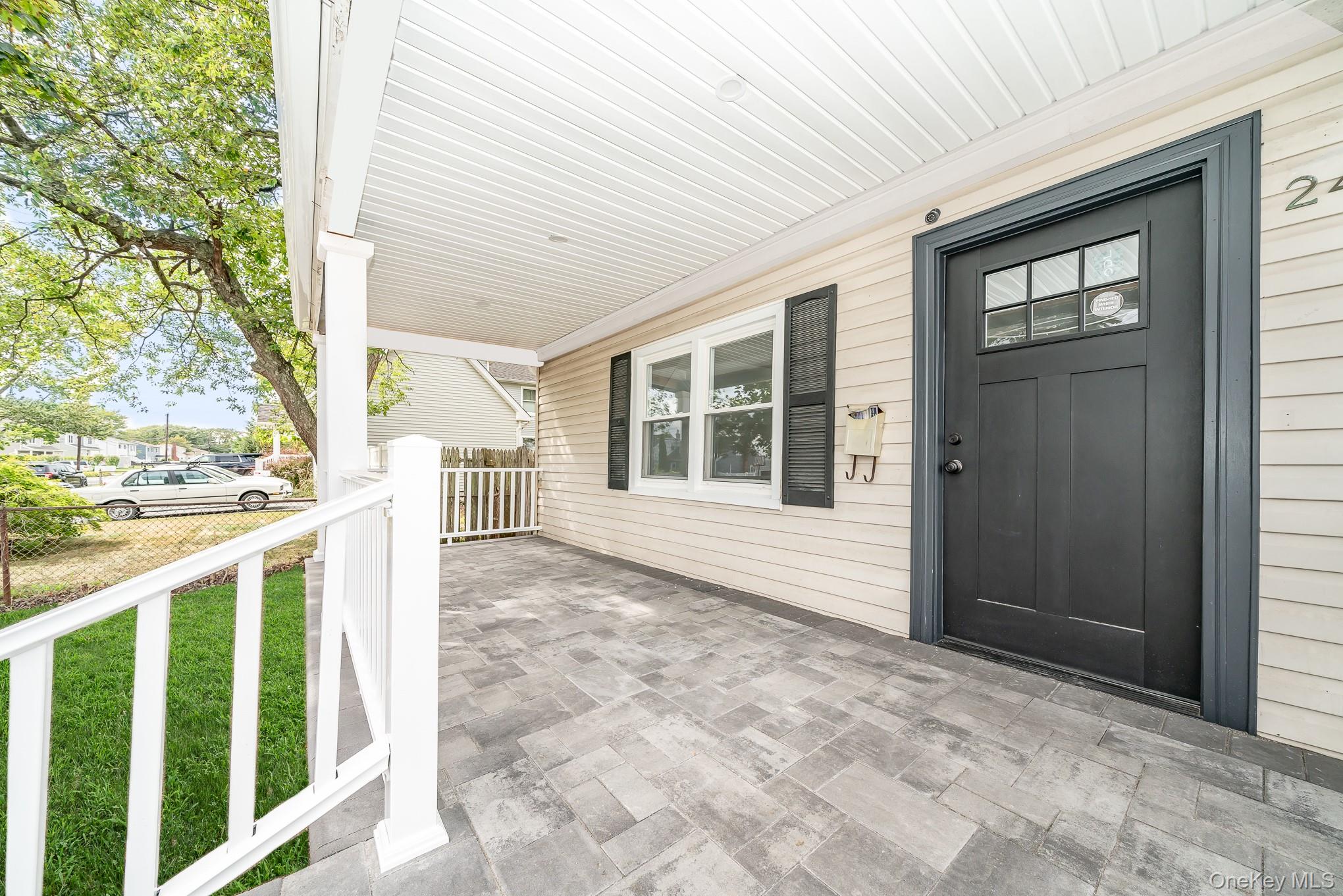24 Calvert Avenue West Babylon, NY 11704 - Photo 4 of 28 Doorway to property with covered porch
