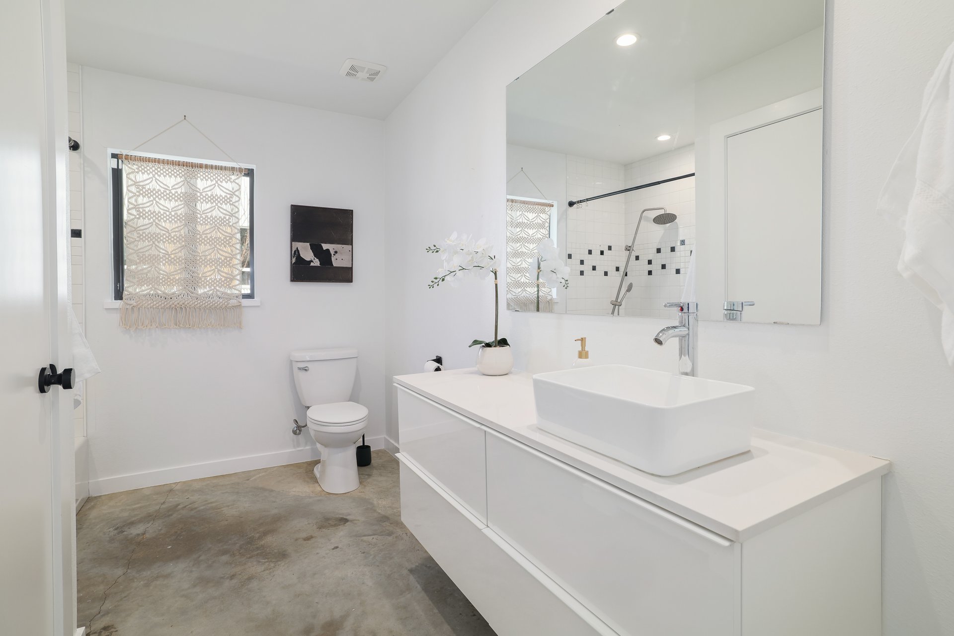 1310 Green Street Lockhart, TX 78644 - Photo 13 of 25 Full bathroom with concrete floors, vanity, and a stall shower