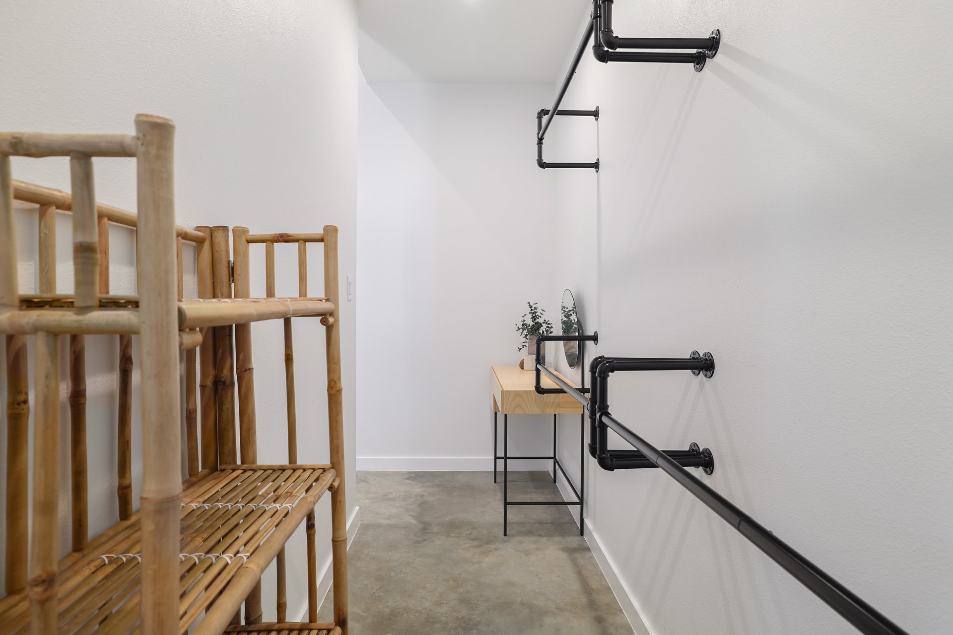 1310 Green Street Lockhart, TX 78644 - Photo 22 of 25 Corridor featuring concrete flooring and baseboards