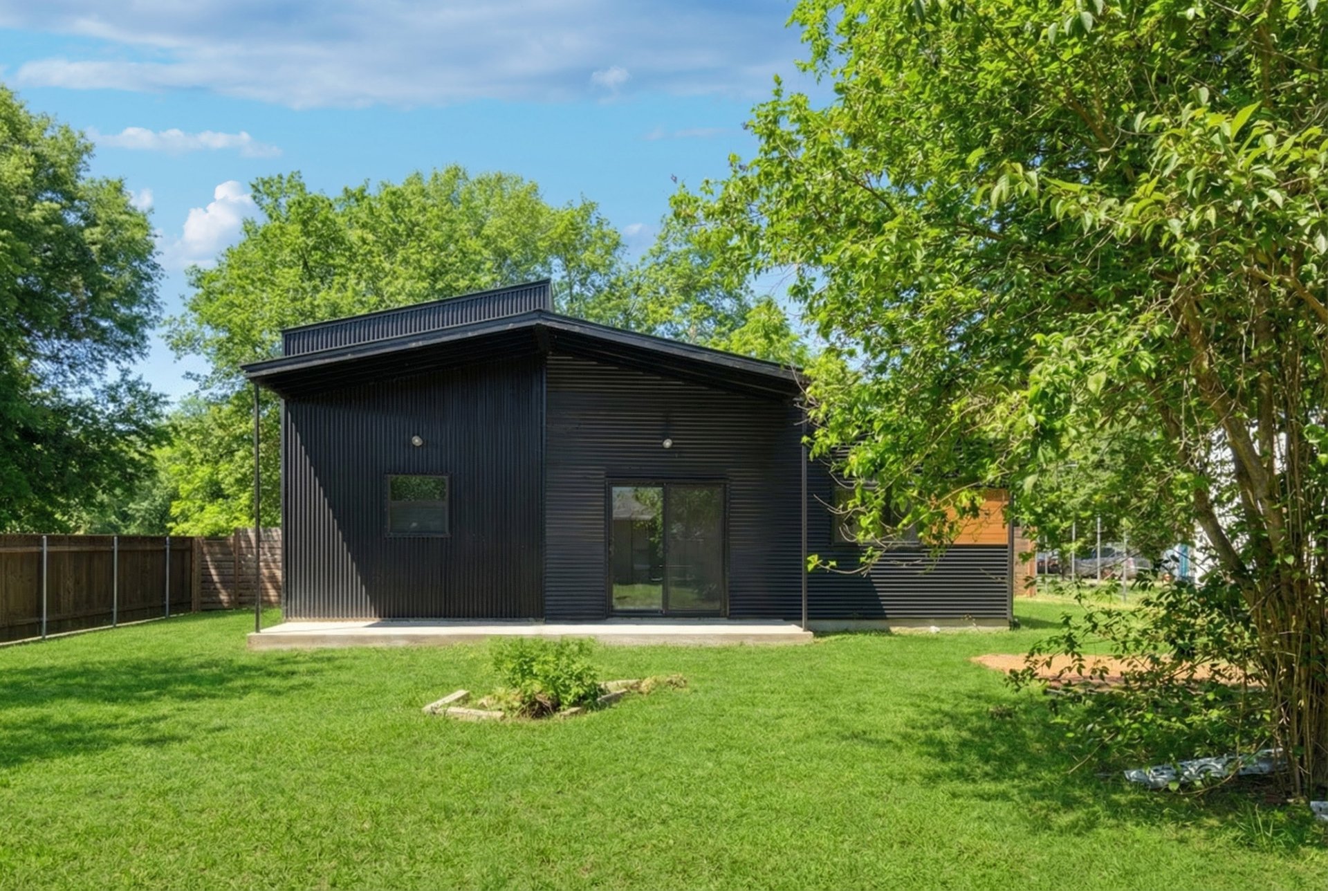 1310 Green Street Lockhart, TX 78644 - Photo 23 of 25 Back of house with a patio