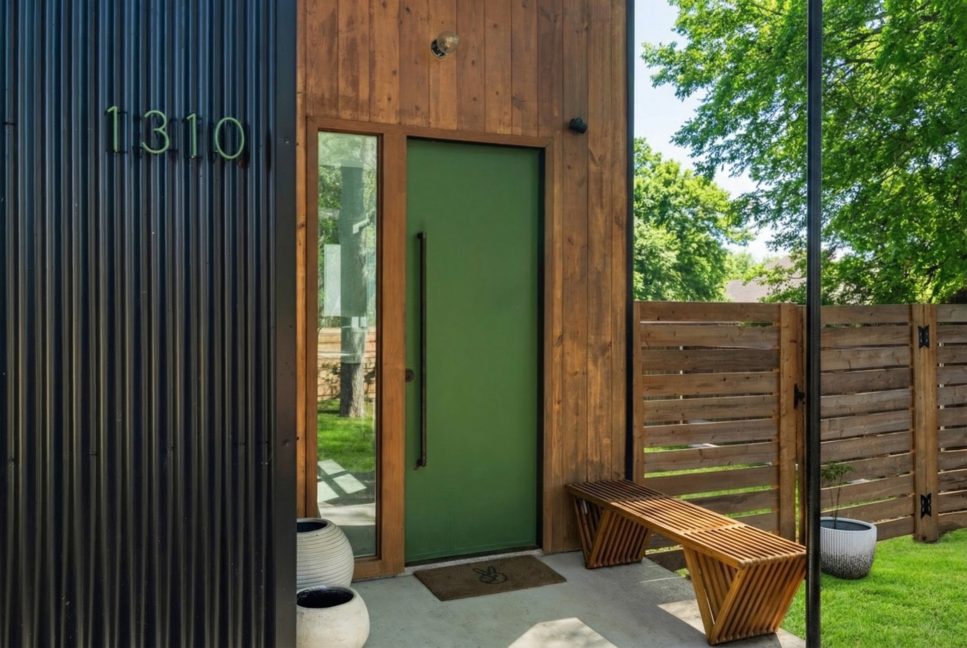 1310 Green Street Lockhart, TX 78644 - Photo 3 of 25 View of exterior entry with a patio