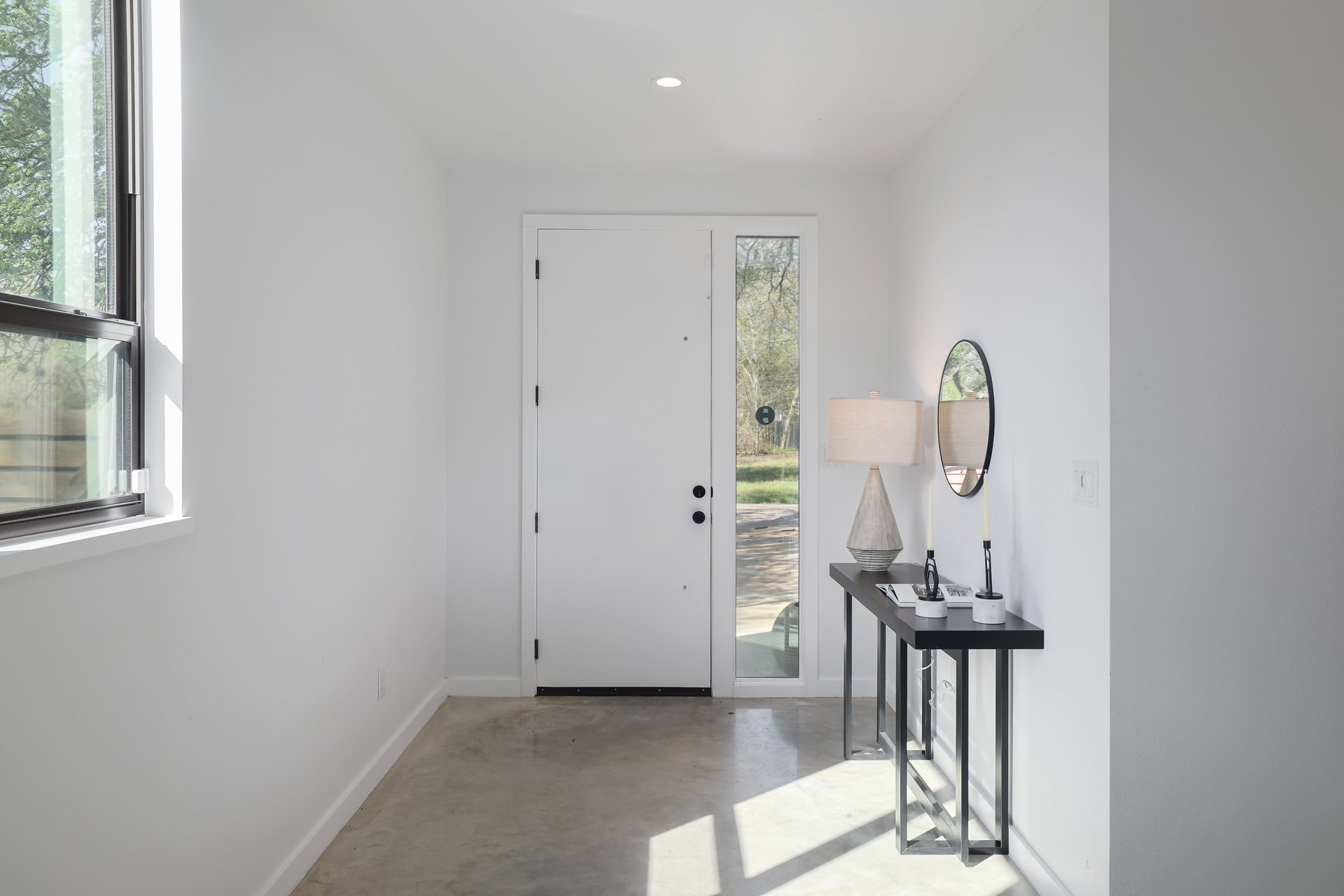 1310 Green Street Lockhart, TX 78644 - Photo 4 of 25 Entryway featuring finished concrete floors and recessed lighting