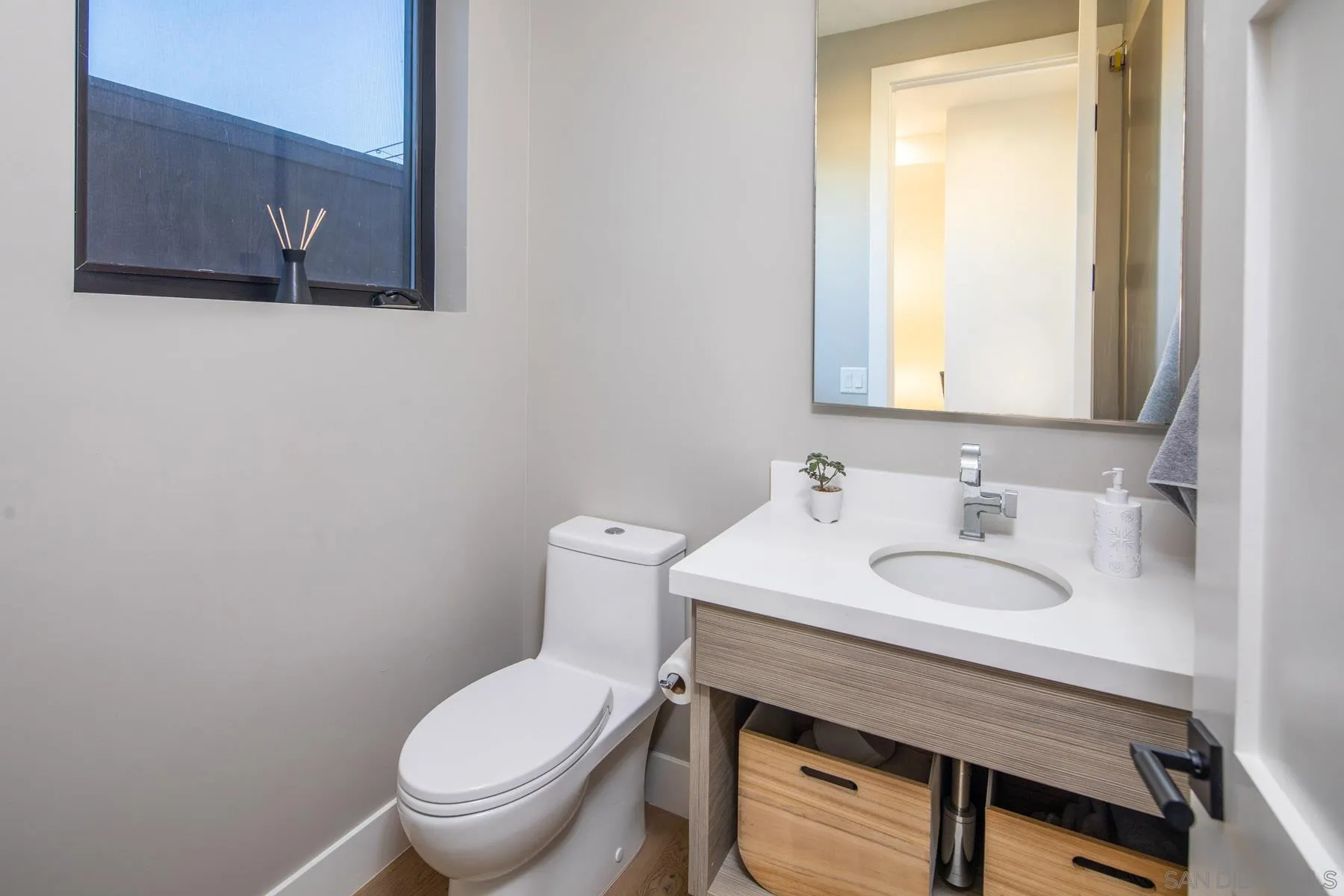 307 La Mesa Avenue Encinitas, CA 92024 - Photo 12 of 33 a bathroom with a sink and a toilet