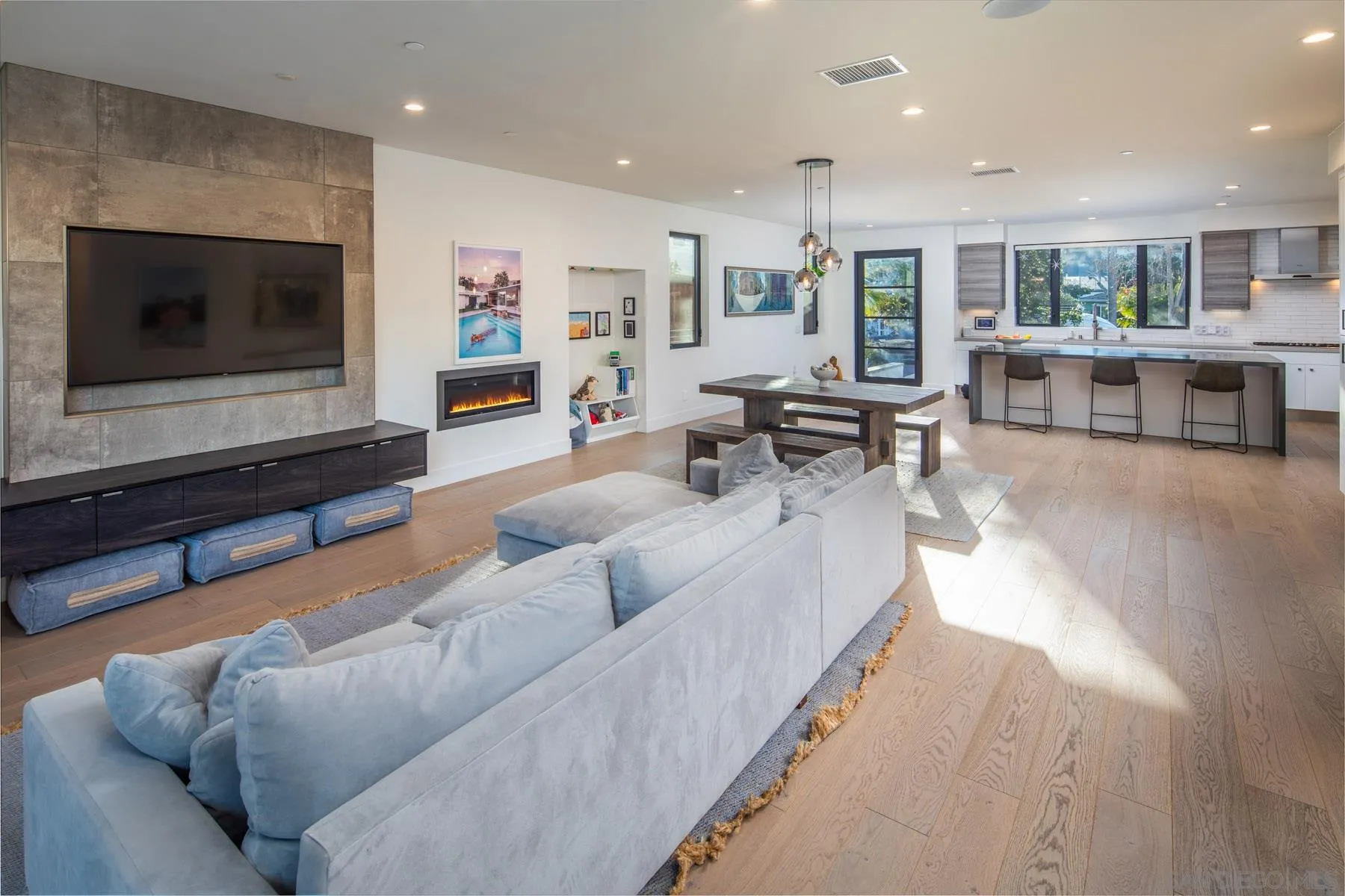 307 La Mesa Avenue Encinitas, CA 92024 - Photo 2 of 33 a living room with furniture and a flat screen tv