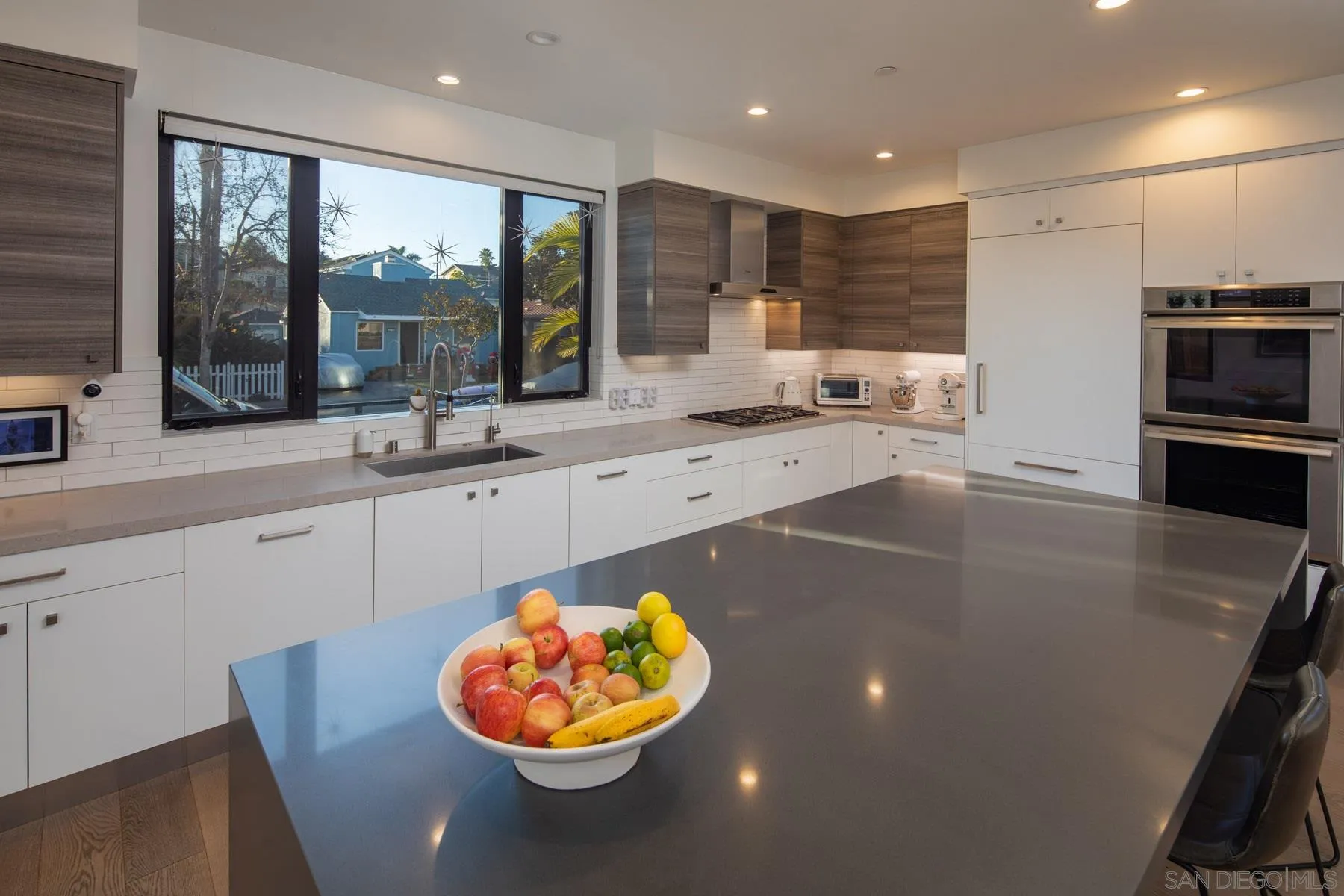 307 La Mesa Avenue Encinitas, CA 92024 - Photo 4 of 33 a large kitchen with stainless steel appliances a large counter top