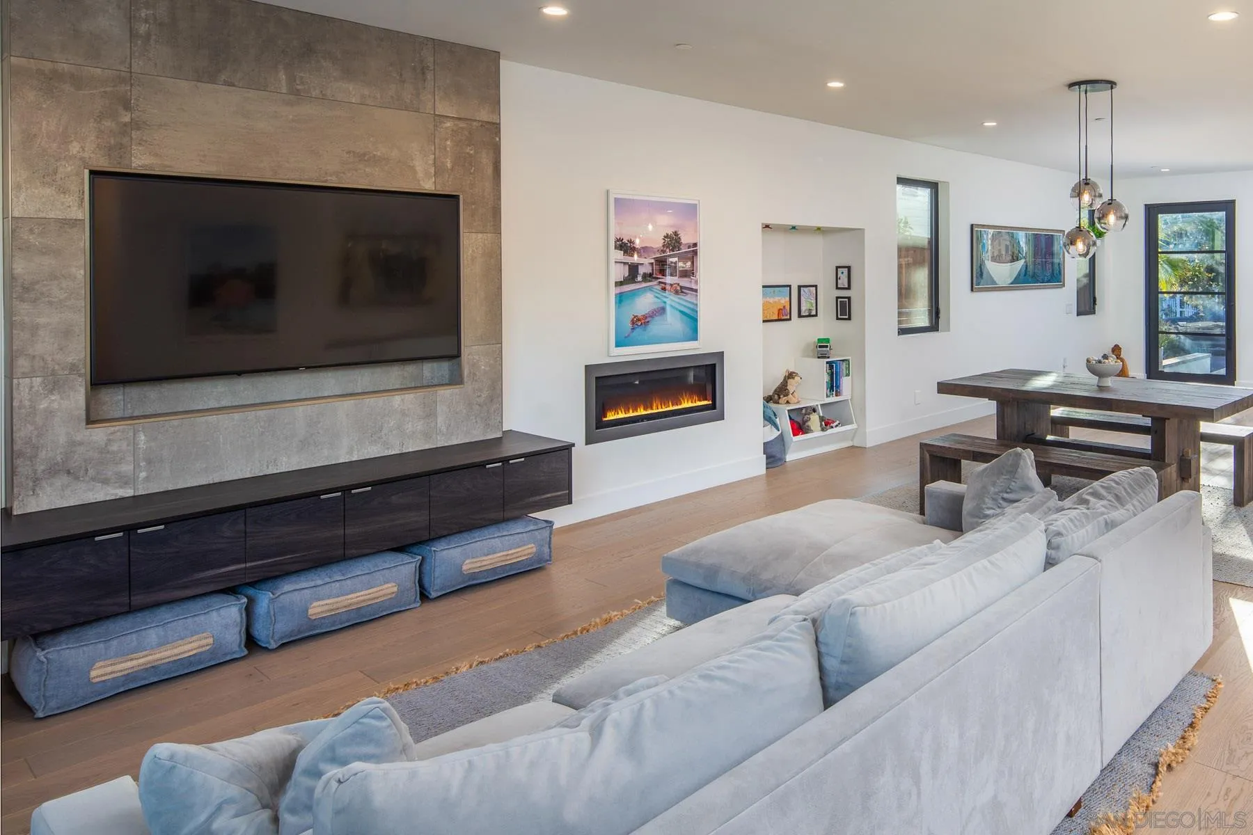 307 La Mesa Avenue Encinitas, CA 92024 - Photo 7 of 33 a living room with furniture and a fireplace