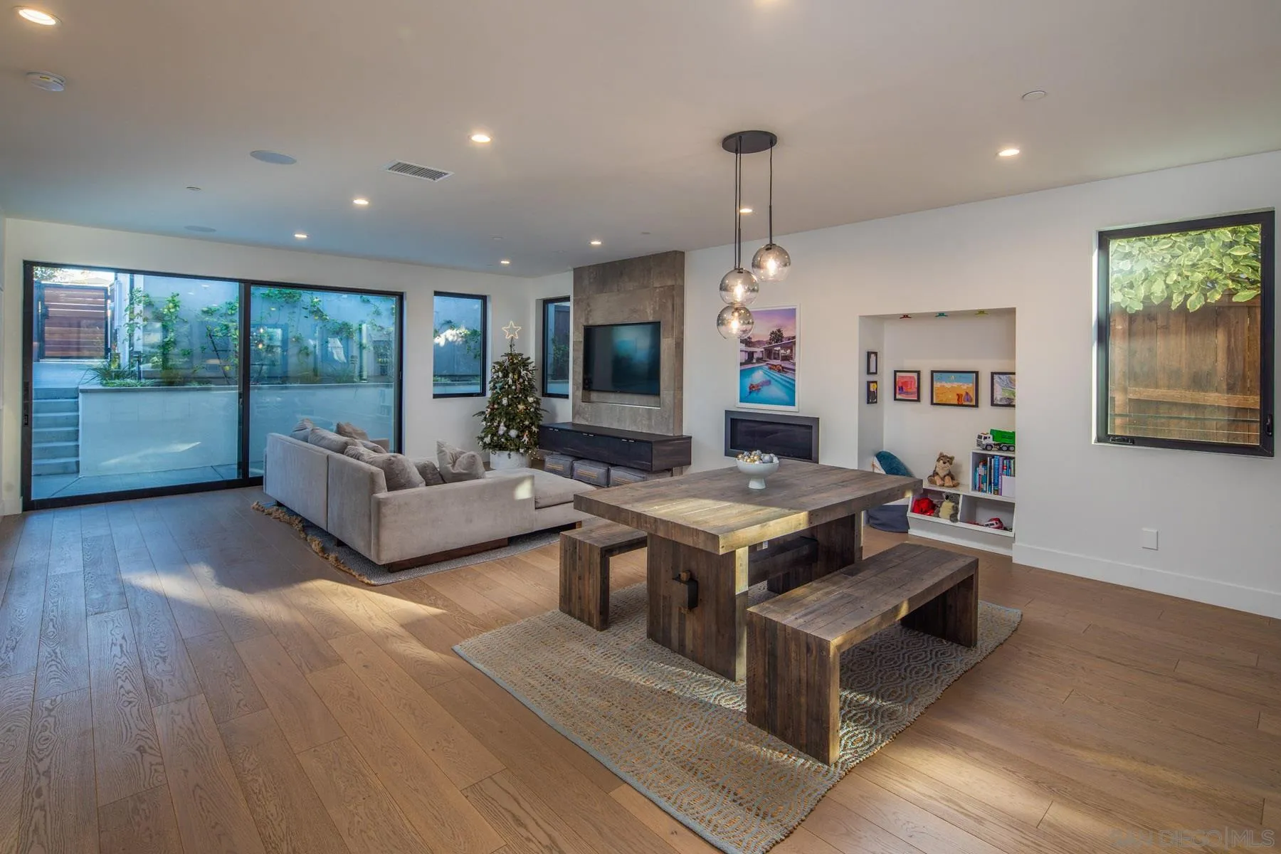 307 La Mesa Avenue Encinitas, CA 92024 - Photo 8 of 33 a living room with fireplace furniture and a large window