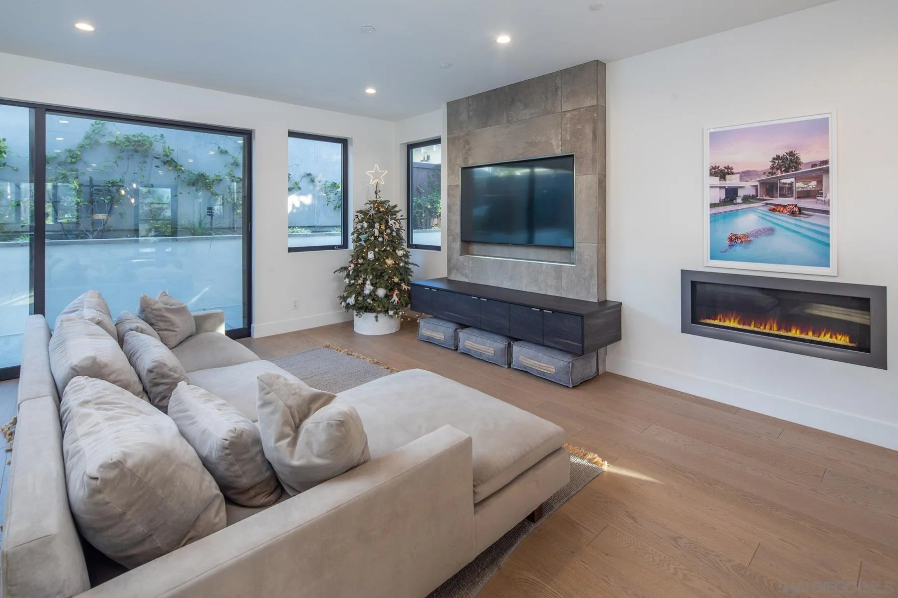 307 La Mesa Avenue Encinitas, CA 92024 - Photo 10 of 33 a living room with furniture and a flat screen tv