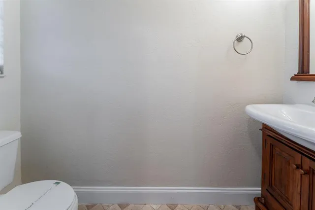 a bathroom with a toilet and a sink