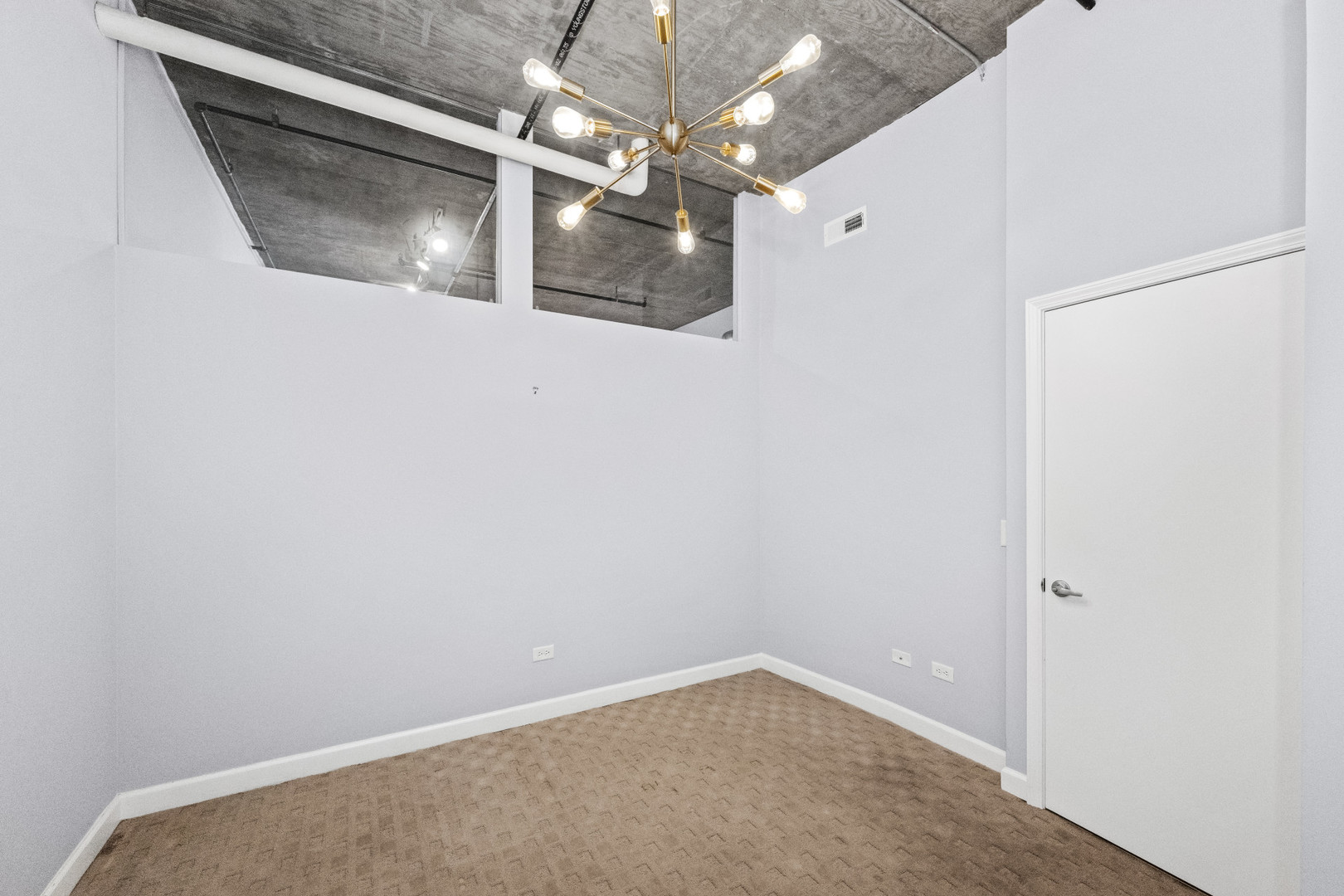 111 South Morgan Street, Unit 805 Chicago, IL 60607 - Photo 7 of 15 a view of a decorative light in a hallway