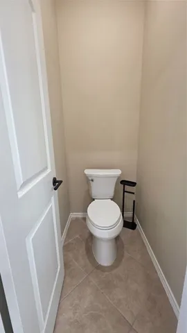 a view of walk in closet with wooden floor