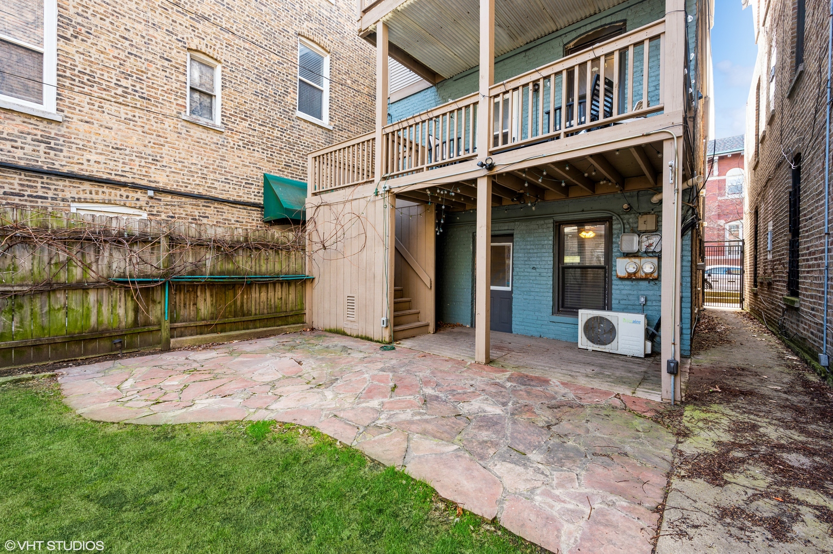 2116 West Lyndale Street, Unit 1 Chicago, IL 60647 - Photo 12 of 16 a view of a house with a yard