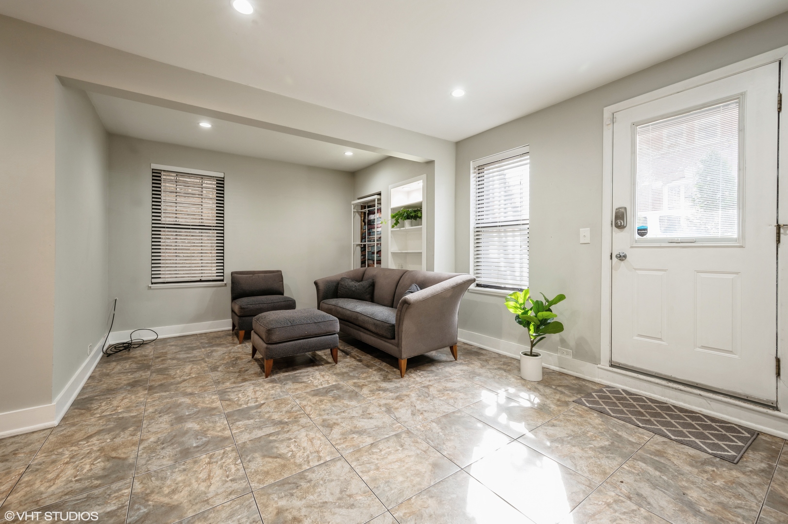 2116 West Lyndale Street, Unit 1 Chicago, IL 60647 - Photo 4 of 16 a living room with furniture and wooden floor