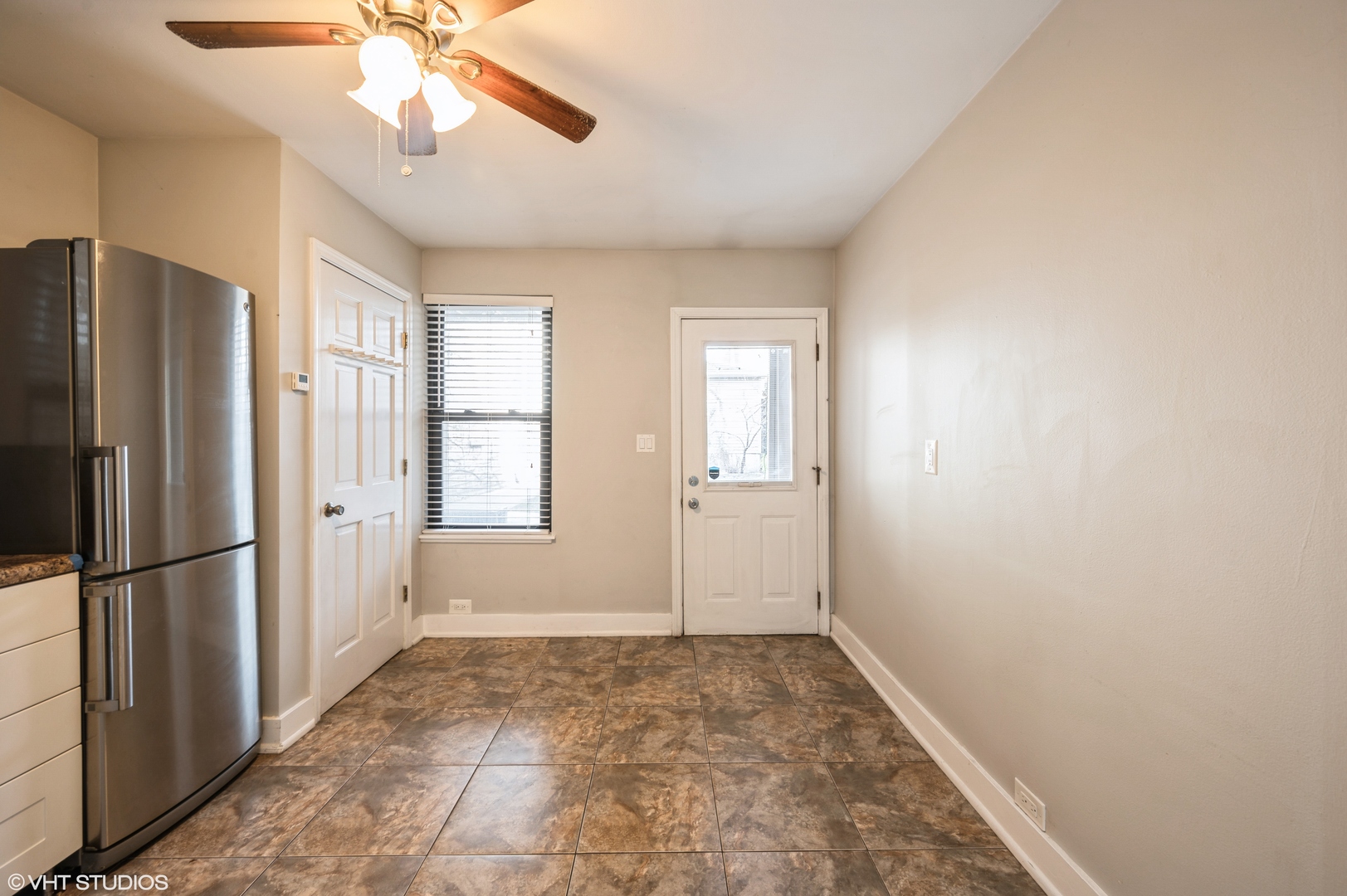 2116 West Lyndale Street, Unit 1 Chicago, IL 60647 - Photo 6 of 16 a view of an empty room with a window