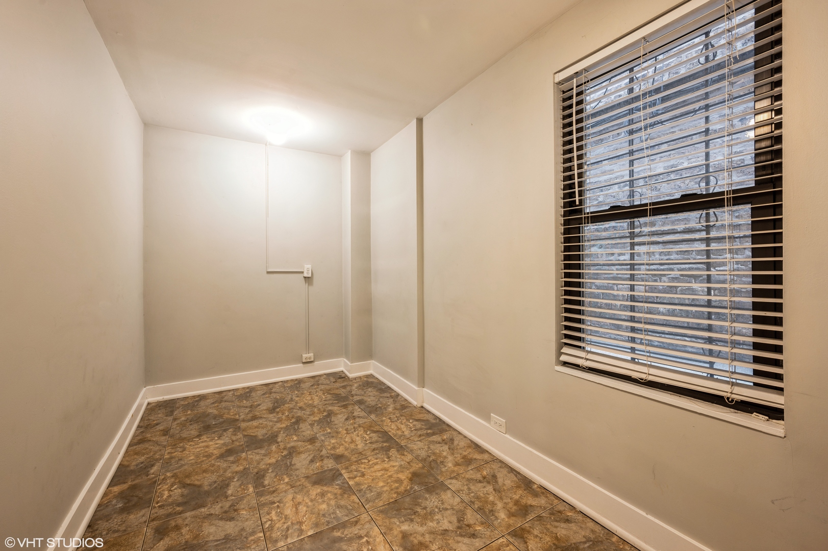 2116 West Lyndale Street, Unit 1 Chicago, IL 60647 - Photo 7 of 16 a view of room with window