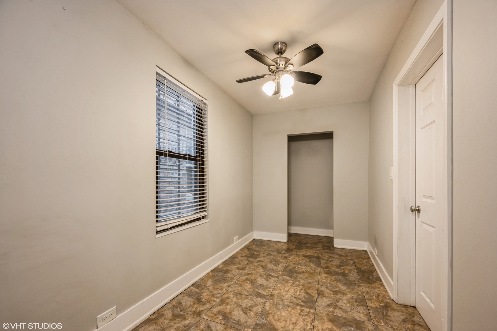 2116 West Lyndale Street, Unit 1 Chicago, IL 60647 - Photo 8 of 16 a view of an empty room and window