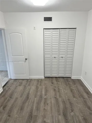 a view of a room with an empty space